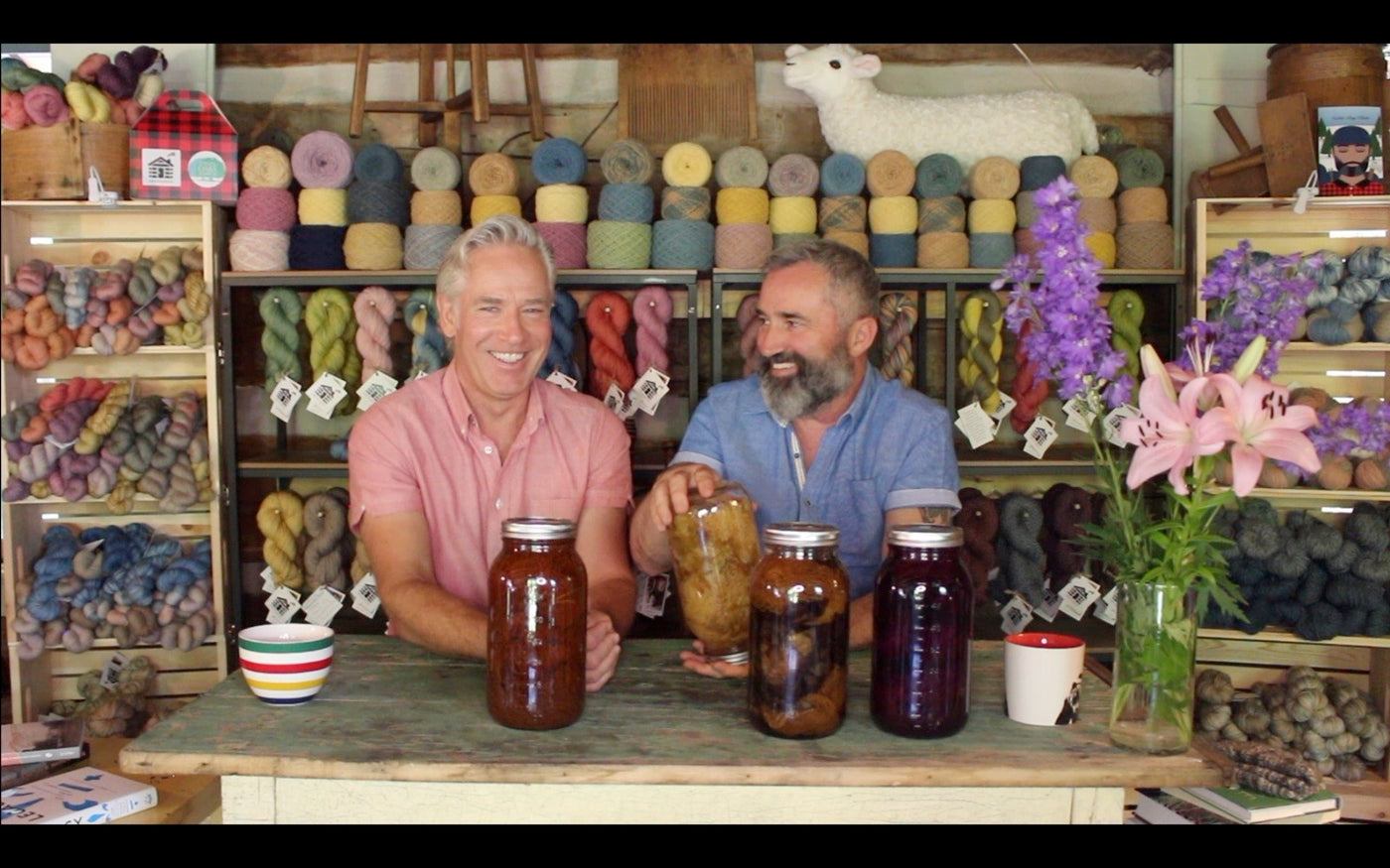 Inside the Cabin Boy Knits shop: shelves of naturally dyed yarn, jars of dye and two makers at the counter